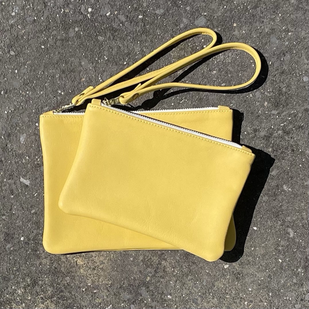 Bright Leather Clutch Bag with Wrist Strap. Hurdwick Handmade Bag Company